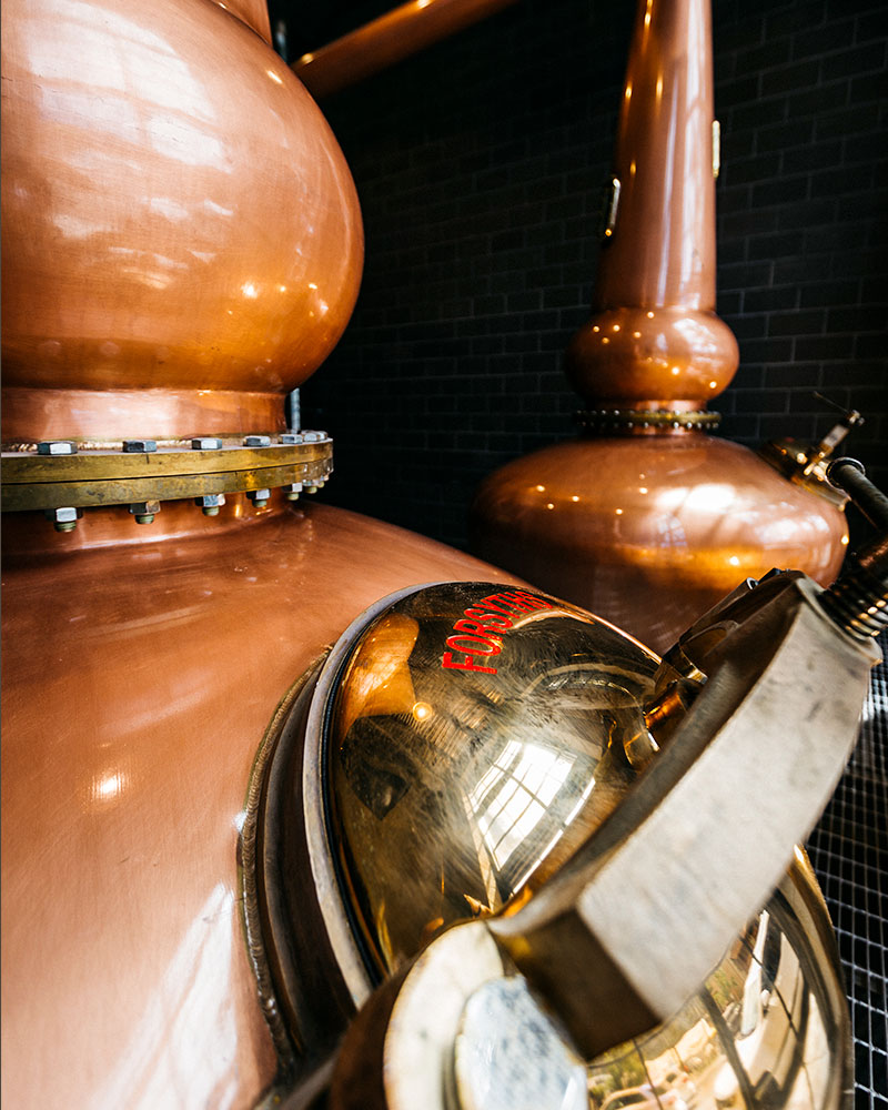 lineup of Warfield spirits focusing on the Barrel Aged Gin